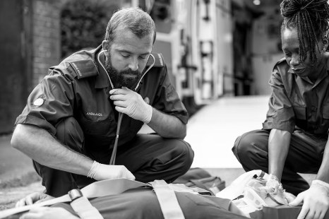 Medical team treating a patient in the field